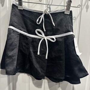 Forever 21 Black Mini Skirt with White Trim & white bows.
